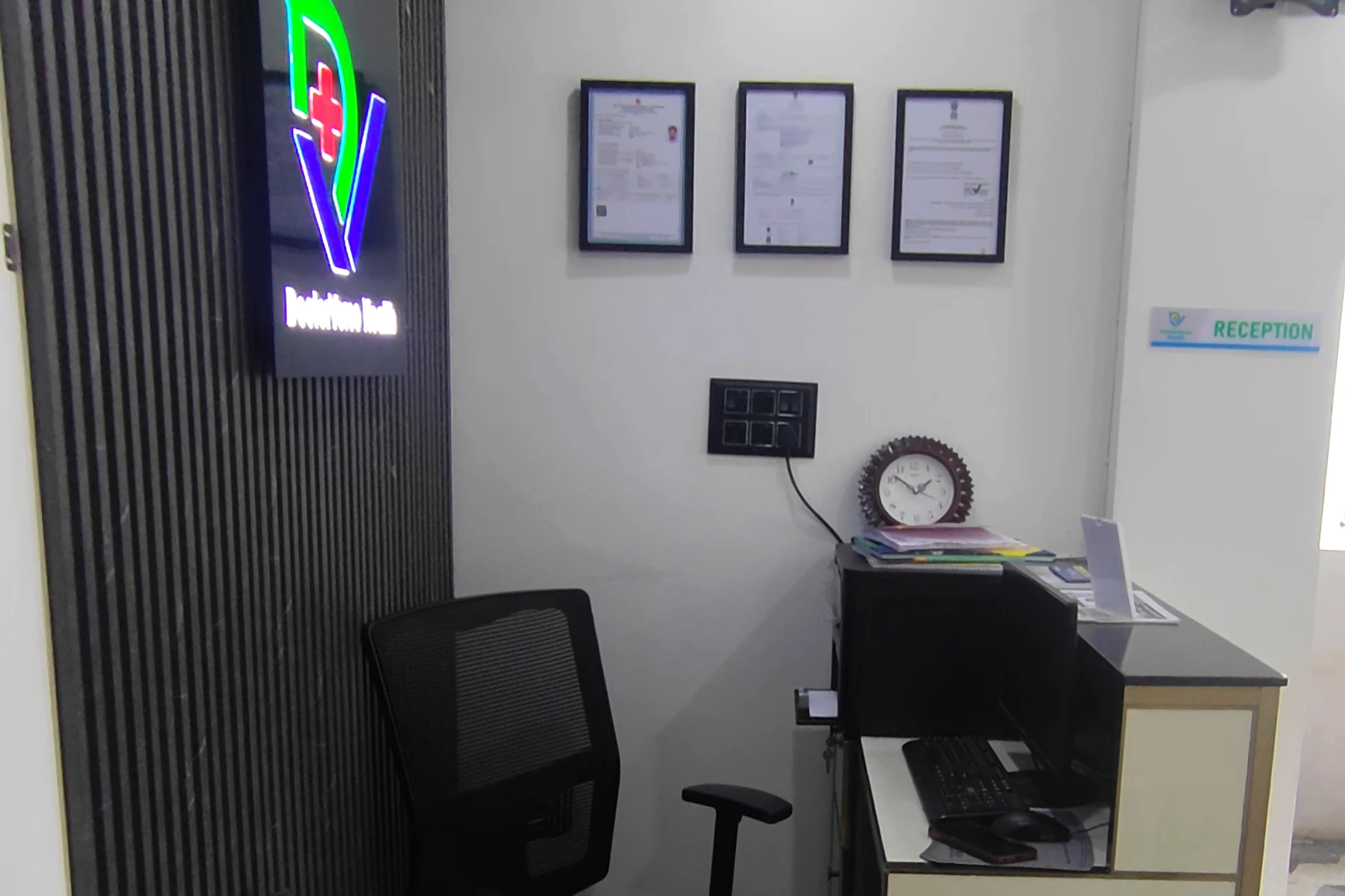 DoctorVerse reception desk and clinic sign